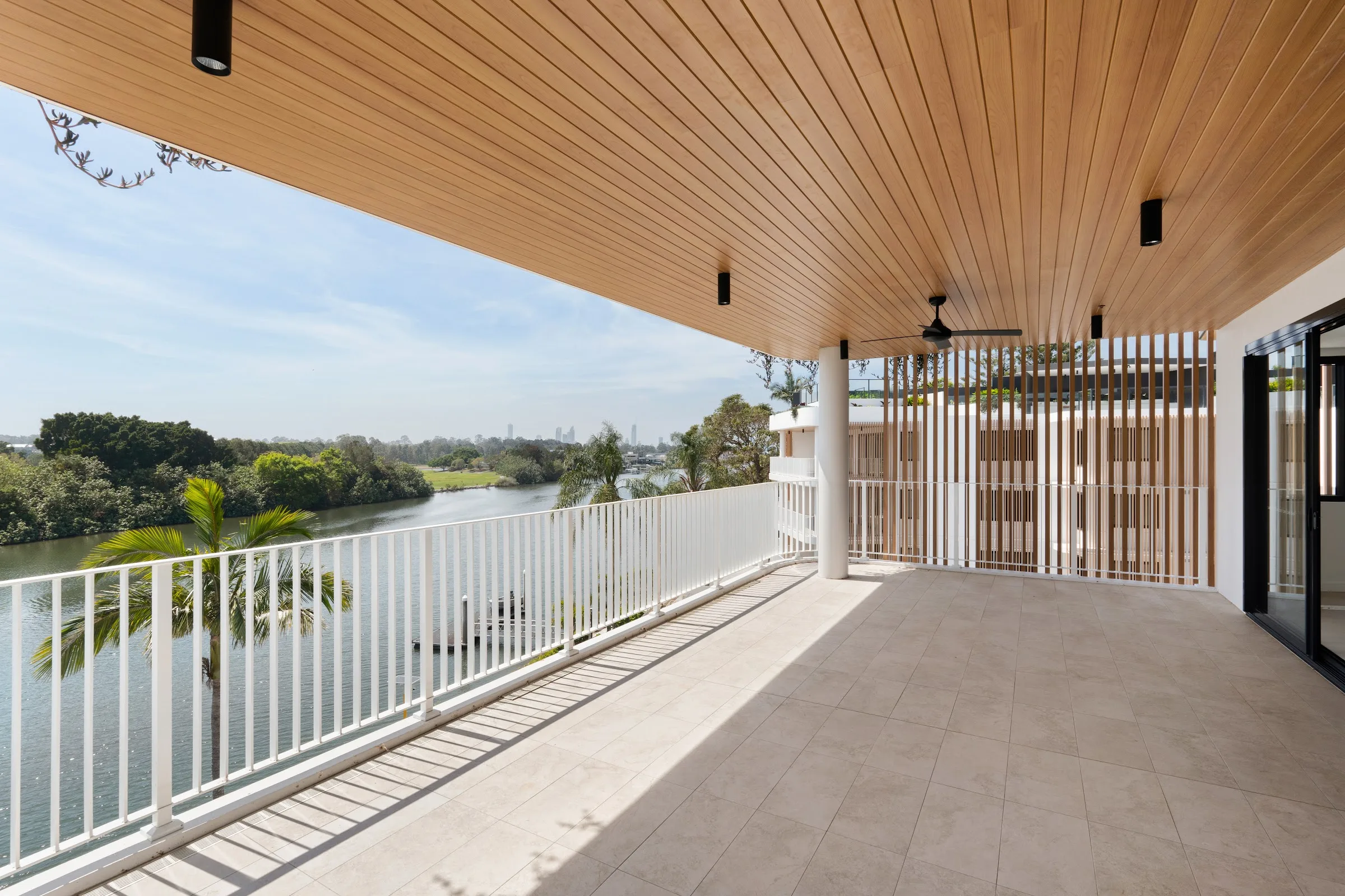 Covered balcony at sunset over the river