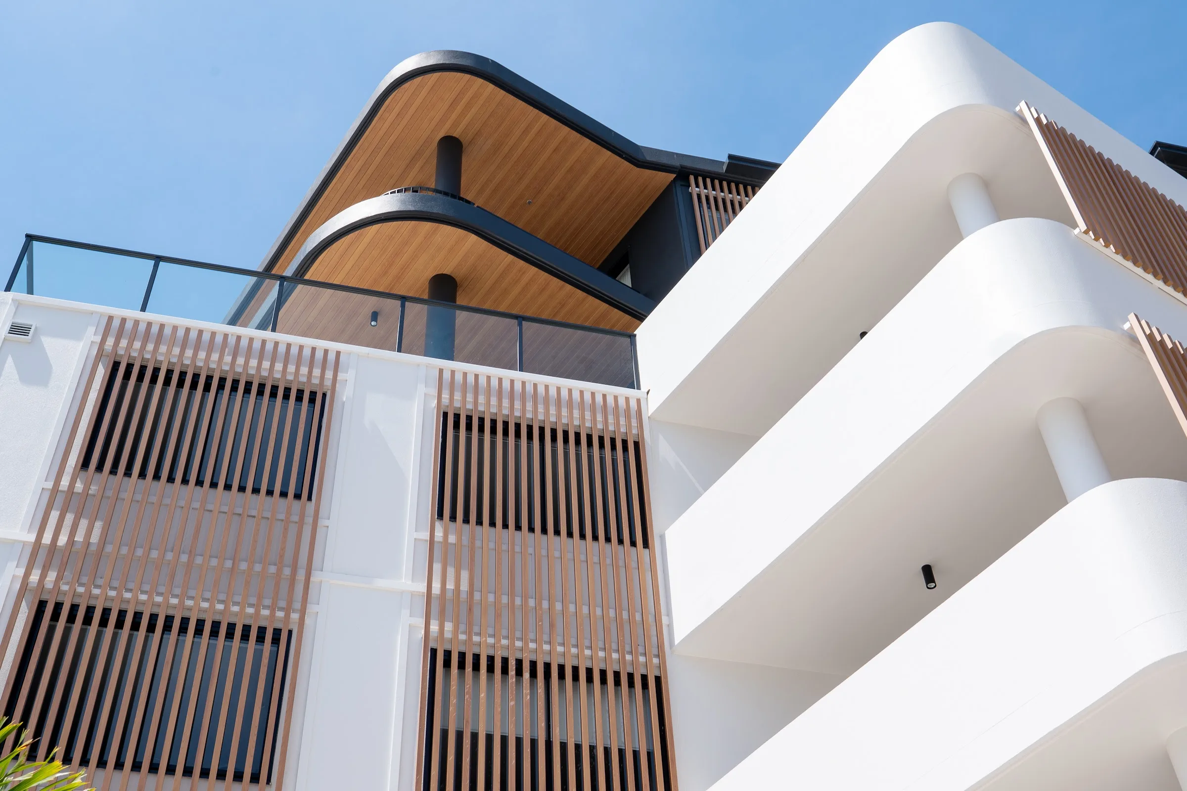 Curved balcony edges against the sky
